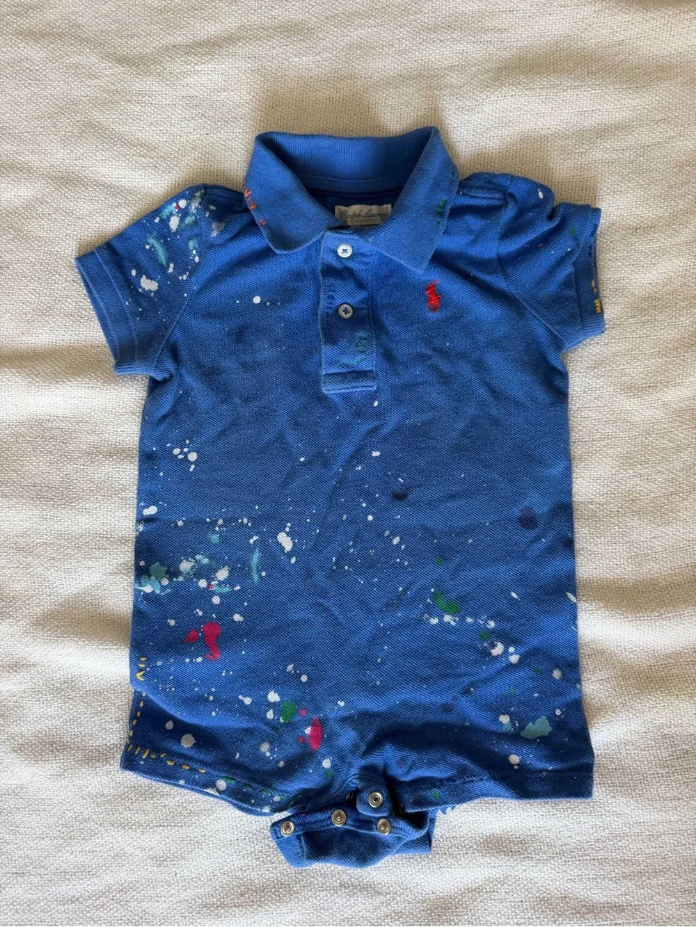 Ralph Lauren Royal Blue Polo Romper with Multicolor Paint Splatter
